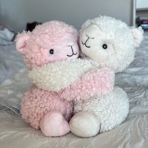 Warmies hugging sheep weighted stuffed animal